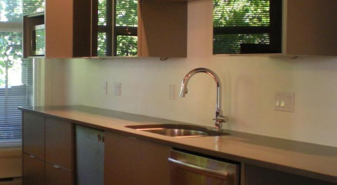 grey lower cabinets with high-gloss black upper cabinets in Victoria BC