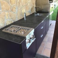 Outdoor aluminum kitchen on wheels in violet purple