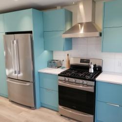 Aluminum kitchen cabinets including pantry in Robin's Egg Blue