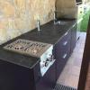 Outdoor aluminum kitchen on wheels in violet purple