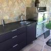 Outdoor aluminum kitchen on wheels in violet purple