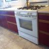 before photo of burgundy 80s style kitchen